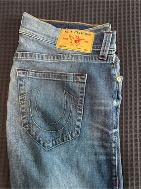 True Religion Men’s Light Blue Straight Jeans with Signature Pocket Stitching